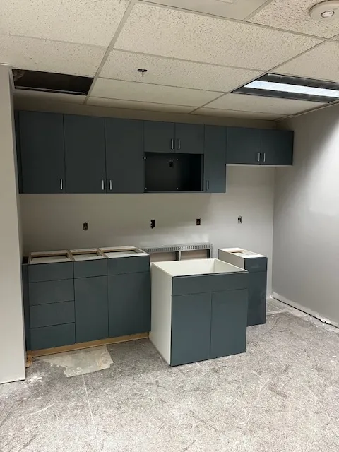 Kitchen cabinetry installation during a Sun Valley Construction remodel